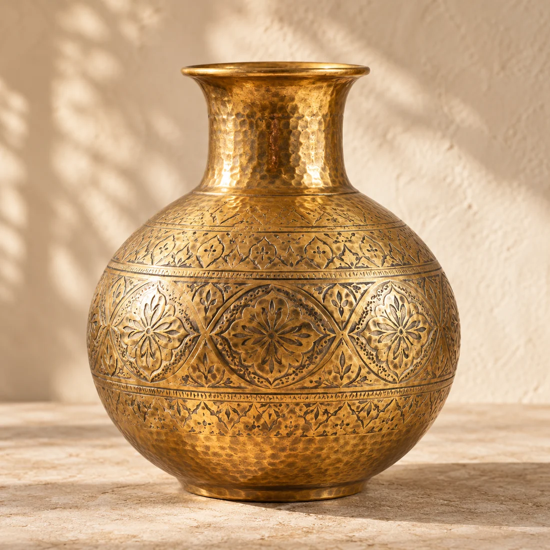 Engraved brass vase